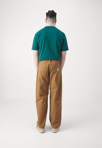Carhartt WIP Vaqueros baggy - light brown