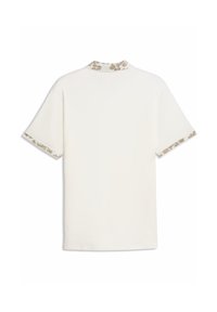 Λευκό πουκάμισο με κοντά μανίκια και διακοσμητικό με λουλουδάτο σχέδιο στο γιακά και στις άκρες των μανικιών. Λείο ύφασμα με άνετη εφαρμογή.