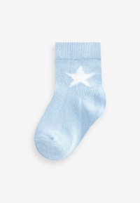 Calcetín de algodón azul claro con textura acanalada; presenta un patrón de estrellas blancas en el lateral y una parte superior elástica ajustada.