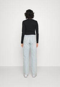 Milk it SPLIT - Camisola de manga comprida - black