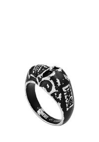 Black steel ring featuring a textured skull design with distressed silver accents and the brand name "Diesel" engraved on the side.