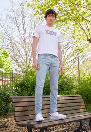 512™ SLIM TAPER JEANS - Slim fit -farkut - medium indigo worn in