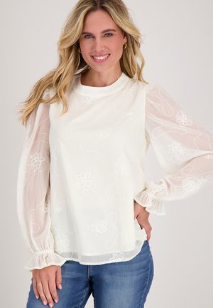 Witte blouse met sheer, geplooide lange mouwen, geborduurde bloemenpatronen en elastische boorden. Gladde textuur en ronde halslijn.
