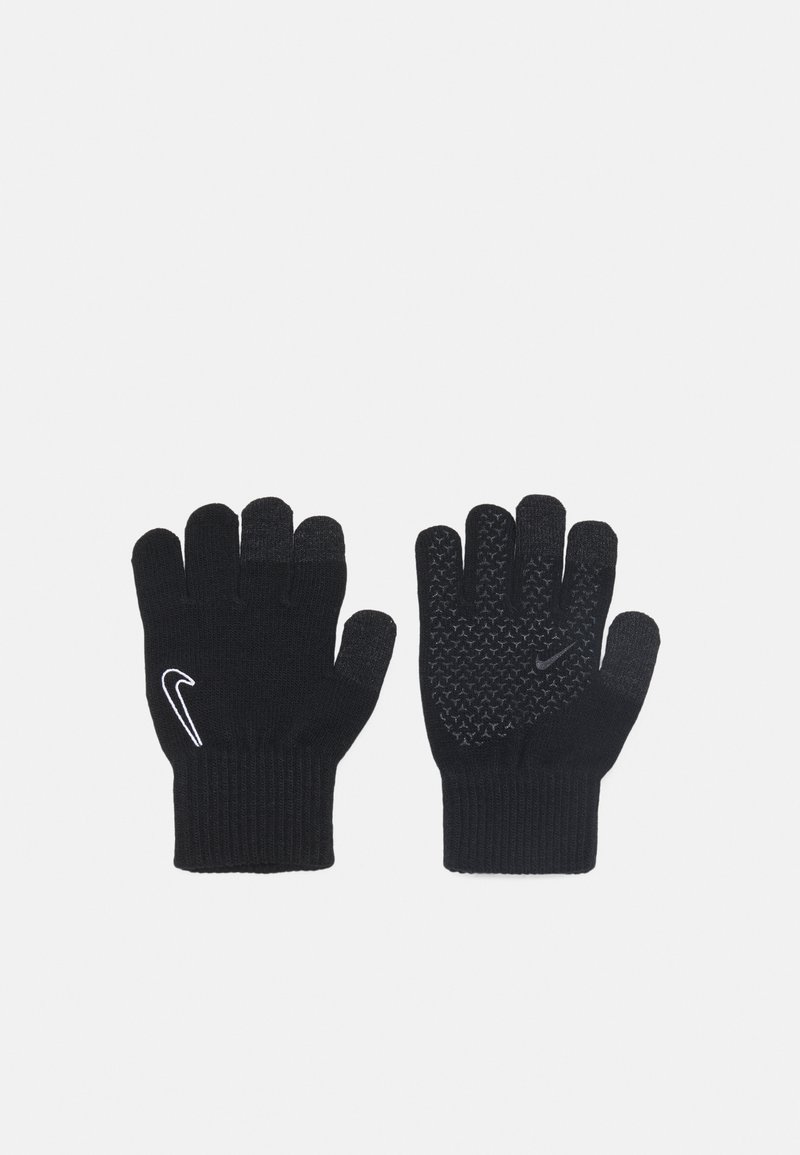 Guantes de punto negros con agarre texturizado en la palma y los dedos, con un logo de Nike blanco en la muñeca.