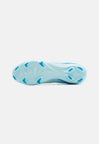 Light blue running shoe outsole with a smooth texture, featuring traction grooves and contrasting darker blue accents.