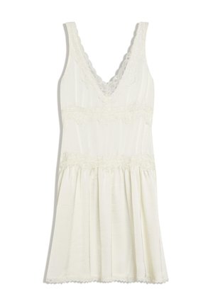 Witte mouwloze jurk met V-hals, kanten rand langs de halslijn, taille en zoom, en een geplooide rok.