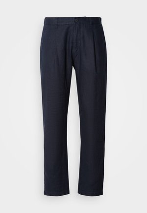 Marineblaue Leinenhose mit geradem Schnitt, ausgestattet mit einem Knopfverschluss, einer gefältelten Vorderseite und subtiler Textur. Leichter Stoff.