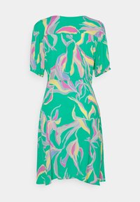 Robe courte à manches courtes verte, coupe ample avec un motif floral abstrait en pastel rose, jaune, violet et gris sur fond uni.