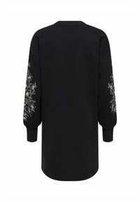 Must oversized dressipluus pika varrukaga, millel valged lillemustriga tikandid varrukatel ning soonikkoes varrukaotsad ja kaelus.