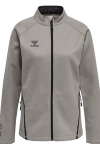 Veste grise zippée avec fermeture éclair noire, poches latérales zippées, col montant et petit logo noir hummel sur la poitrine gauche.