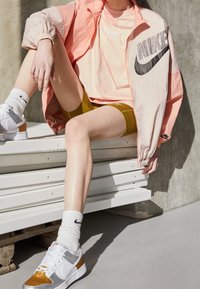 Nike Sportswear Větrovka - orange