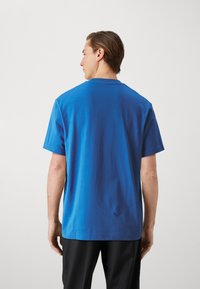 Lacoste Camiseta básica - ladigue