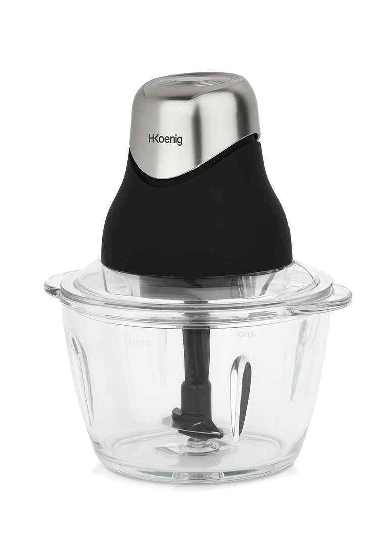 Cutter elettrico con un coperchio in plastica nera e accenti in acciaio inossidabile, ciotola in vetro trasparente e una lama di miscelazione nera all'interno.