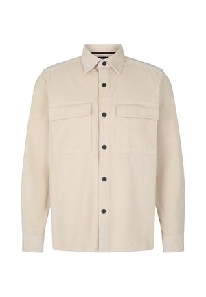 Beige corduroy shirt with long sleeves, collar, two chest pockets, and black buttons down the front. Textured fabric with ribbed pattern.