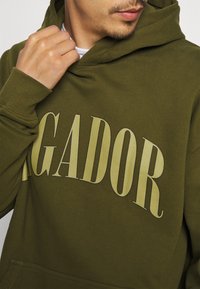 Pegador Felpa con cappuccio - olive