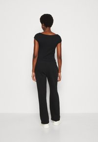 GAP HERITAGE - Tepláky - true black