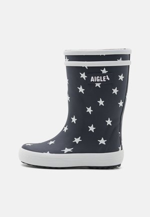 Blue rubber rain boot with white star patterns, white sole, and a branded label. Features a rounded toe and a mid-calf height design.