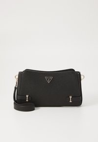 Zwarte vegan leren crossbody tas met een textuurovervlak, handtekeninglogo, ritssluiting en verstelbare schouderband. Voorzien van hardware in goudkleur.