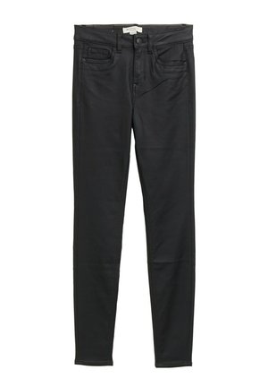 Jeans skinny de mezclilla negra con cinco bolsillos, cremallera y trabillas para el cinturón. Textura suave y un diseño ajustado a lo largo de las piernas.