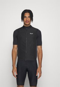 Schwarze Radweste mit hohem Kragen und Reißverschluss, aus leichtem Material gefertigt. Verfügt über kurze Ärmel und ein dezentes Logo auf der Brust.