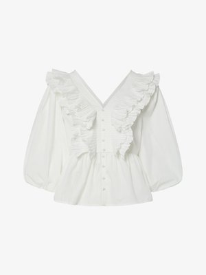 Fehér blúz mély V-dekoltárral, puffos ujjakkal és fodros elülső díszítéssel. Pamutból készült, gombos záródással és texturált részletekkel.