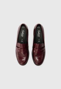 Burgundy leather loafers with a textured finish, featuring a flat sole and stitched detailing. Labeled “Gabor comfort” inside. Size 4.5 G.