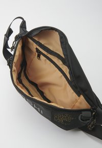 Marsupio Teschio - Dettagli, Articoli da Regalo, Giocattoli in Legno