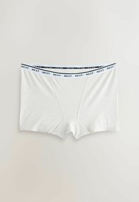 Boxers blancs pour hommes avec une ceinture élastique marquée portant la mention « NEXT » en texte noir sur fond blanc.