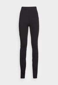 Leggings de sport noir à taille haute, fabriqués en tissu extensible. Présentent une coupe ajustée et des poches latérales zippées.