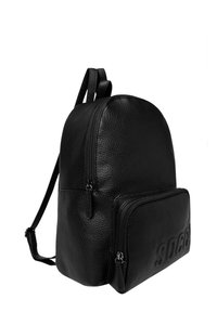 Black leather backpack with a textured finish, rounded shape, top zip closure, and a front zip pocket featuring an embossed logo.