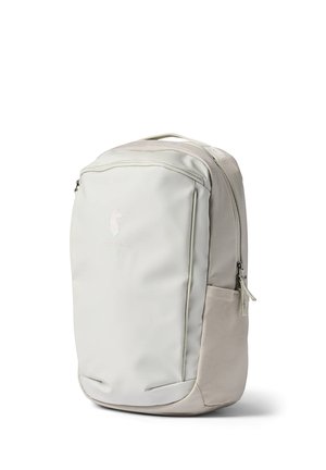 Light gray backpack with smooth front panel, side zipper pocket, and top handle, standing upright on a white background.