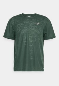 Green athletic t-shirt made from breathable fabric, featuring a geometric pattern of small perforations and a logo on the chest.