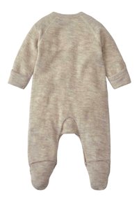 Beige gestrickter Overall mit langen Ärmeln und Fußdesign. Mit gerippten Bündchen und einem weichen, strukturierten Stoff mit einem dezenten Muster.