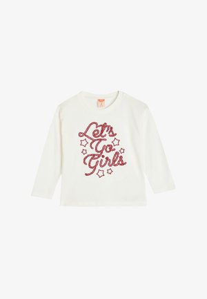 Camiseta de manga larga blanca con texto en cursiva rojo brillante "Vamos Chicas" y acentos de estrellas, fabricada en suave algodón.