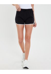 Shorts de sport noirs avec des accents blancs sur les côtés, taille élastique avec cordon de serrage. Fabriqués en tissu doux, longueur au genou.