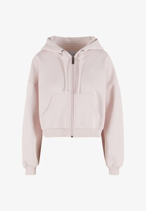 Rózsaszín crop felsőkapucnis pulóver lágy anyagból, cipzáras záródással, elülső zsebekkel, bordázott mandzsettákkal és egy kis hímzett logóval a mellkasnál.