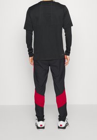 Jordan Träningsbyxor - black