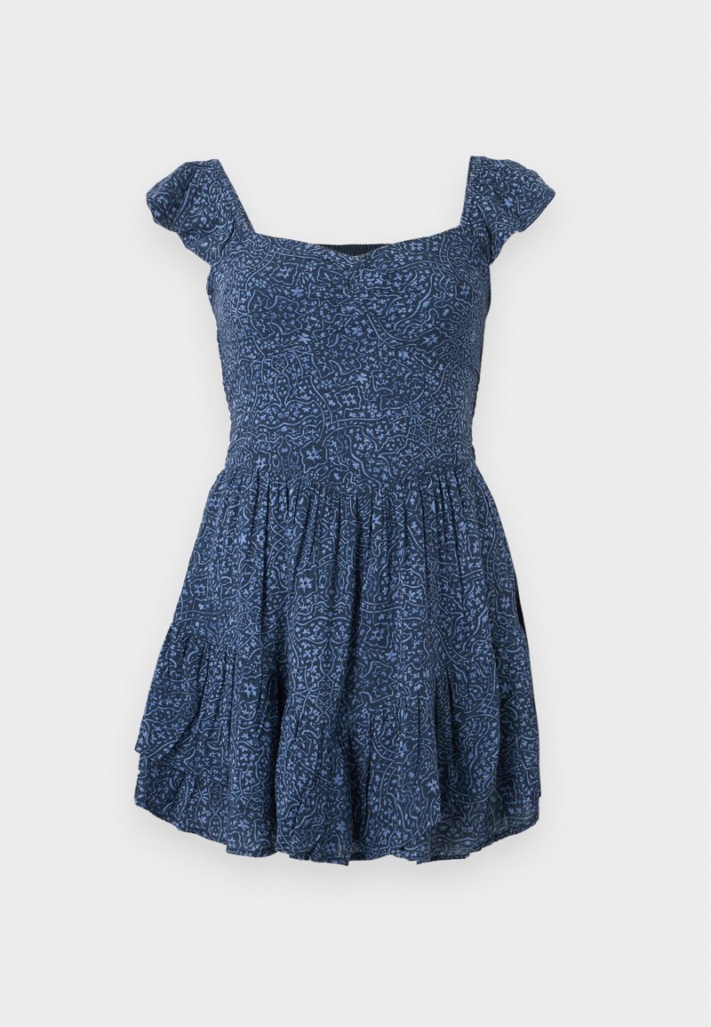 Navy blue dress with patterned fabric, square neckline, and short puff sleeves. Flared skirt with gathered details.