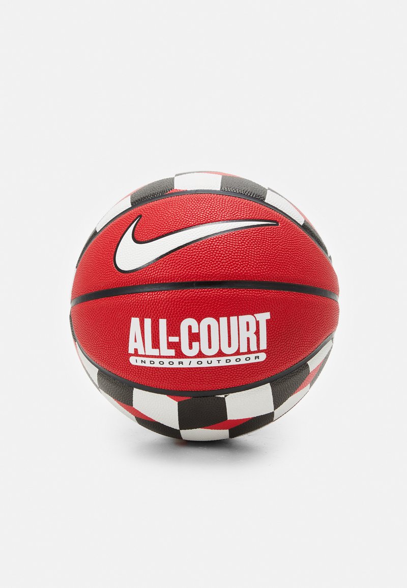 Red basketball with a textured surface, featuring a prominent white Nike swoosh and "ALL-COURT" branding, accented with black and white checkerboard pattern.