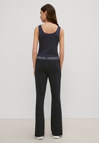 comma casual identity Top