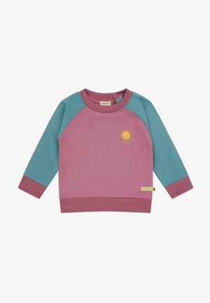 Sweatshirt with pink body, teal raglan sleeves, and a purple ribbed hem. Features a yellow sun embroidery on the front. Cotton blend material.