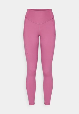 Pink leggings made of stretchy material, featuring a high waistband, side pockets, and contrast stitching details. Smooth texture throughout.