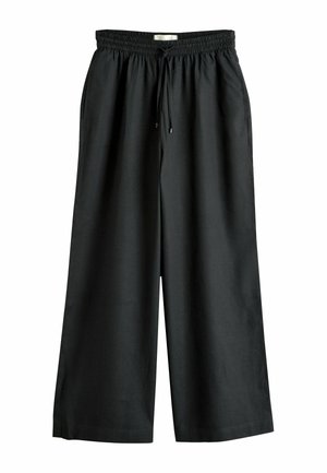 Schwarze, weit geschnittene Hose mit elastischem Bund und Kordelzug, Vorderseitentaschen und lockerem Sitz.