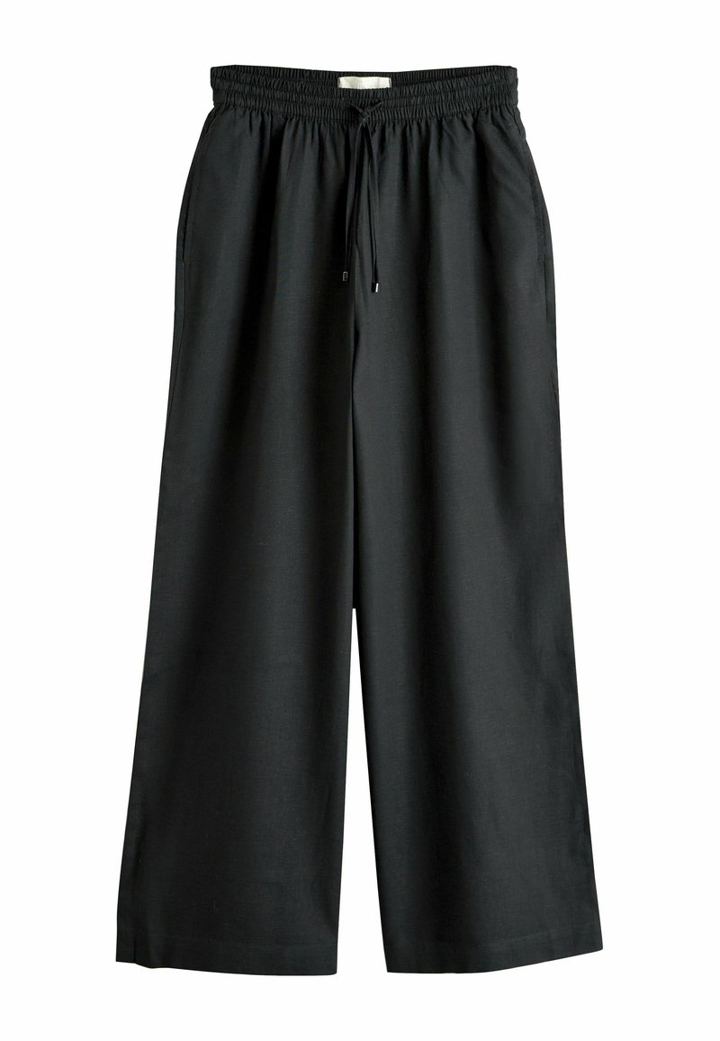 Mustad laia säärega püksid elastse vöökoha ja pingutuspaelaga, esitaskute ja lõdva lõikega.