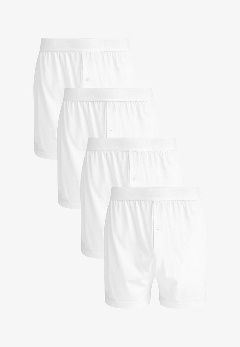 Bóxer de algodón blanco con cinturilla elástica, abertura con botones y una textura suave. Conjunto de cuatro pares idénticos apilados.
