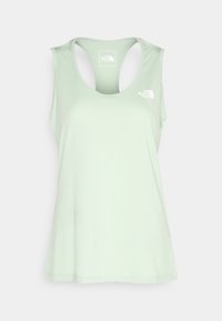 Ljusgrön ärmlös linne i slät tyg, med rund halsringning och subtil logga på vänstra bröstet.