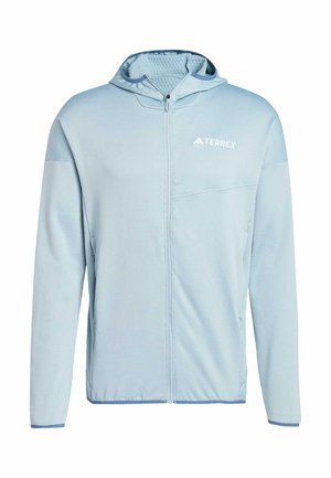 Chaqueta azul claro con cremallera y capucha, mangas largas y logo "TERREX" en el pecho izquierdo.