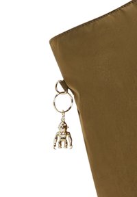 Olive green bag with a smooth texture and a shiny silver keychain resembling a small figure attached to the side.