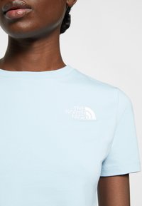 The North Face W ESSENTIAL CROPPED SLIM SHORT SLEEVE TEE - T-shirt estampada - beta blue