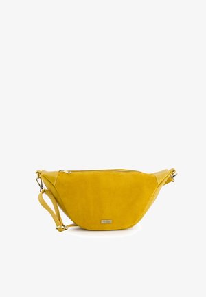 Żółta zamszowa torba na ramię z zamkiem błyskawicznym, o zaokrąglonym kształcie, regulowanym pasku i srebrnych elementach metalowych. Mały detal z logo z przodu.